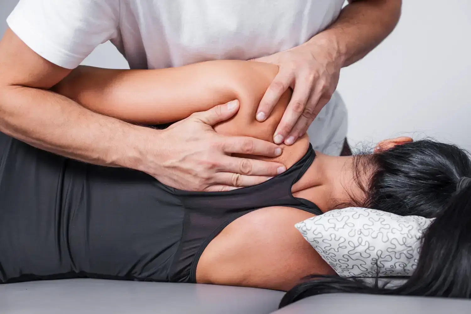 Body massage in spa. Physiotherapy back pain exercises. 